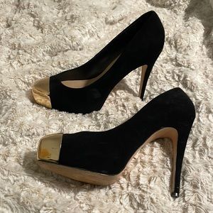 Black heels with gold plated toe